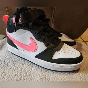 Nike Black and White Shoes with Vibrant Pink Accent